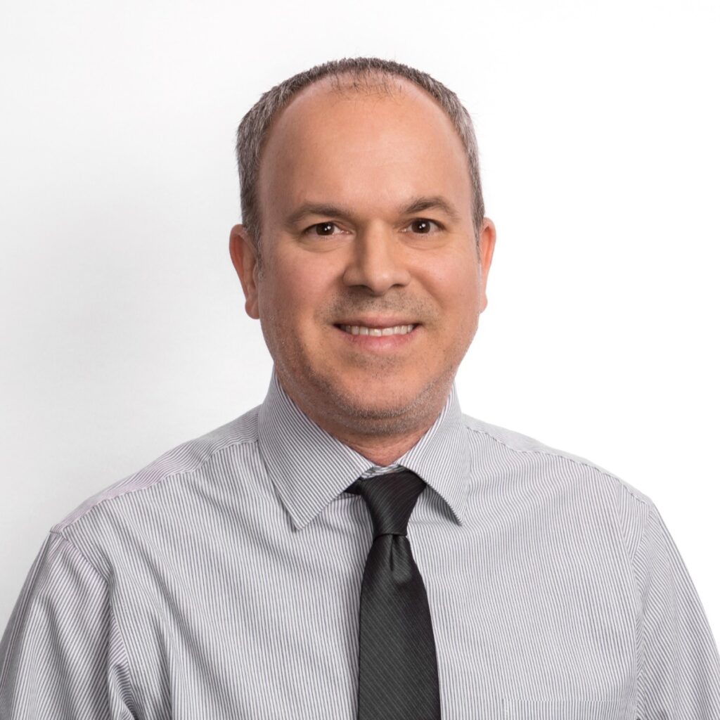 Professional headshot of Christopher Downs