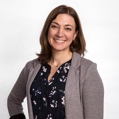 Professional headshot of Kelly Yahi